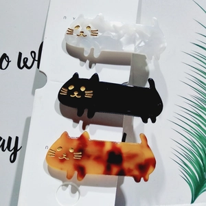 Cute acetate cat hair clips in marble white, solid black and tortoiseshell finish