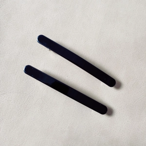 Set of two minimalist black glossy spring hair clips for women's ponytail styles