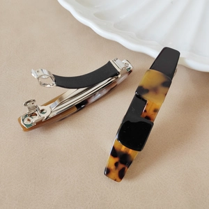 Acetate leopard print hair clip set with tortoiseshell and black patchwork design