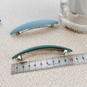 Morandi matte large spring hair clips in blue and green on a 10cm measuring scale