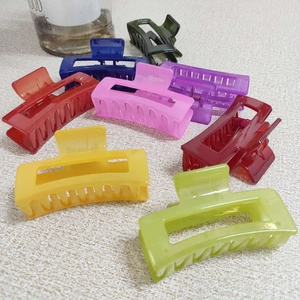 Set of 7 colorful rectangular hollow hair claws in vibrant jelly finish for women