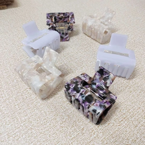 Set of six elegant hollow square hair claws in marble and solid lavender colors