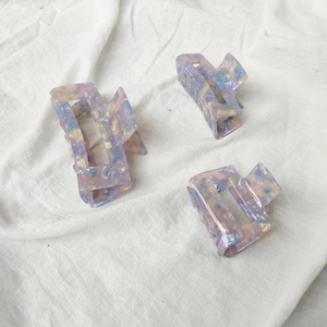 Chic marble patterned acetate hair claw clips set in purple and blue tones for women