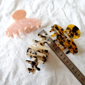 French vintage leopard acetate hair claws in pink, marble white, and classic amber colors