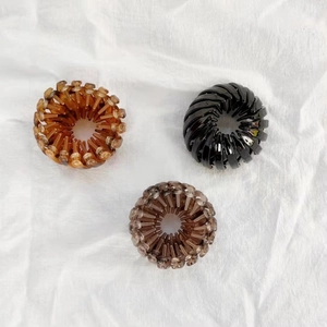 Three colors nesting hair clips in black, brown and amber for bun making hairstyle