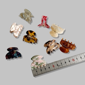 Set of 9 French acetate mini hair claws in leopard and marble patterns for women