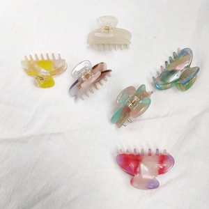 Set of six colorful marble acetate hair claws in minimalist Korean style for women