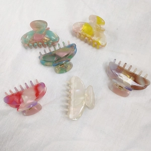 Elegant acetate hair claw clips set in assorted pearlescent and marble colors