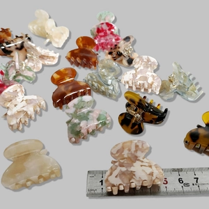 Tortoiseshell acetate hair claws in various patterns for elegant french hair styling