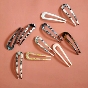 U-shaped acetate hair pins set in various tortoiseshell and marble patterns for women
