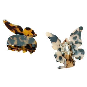 Pinces à cheveux papillon en acétate avec motifs écaille ambre et gris chic