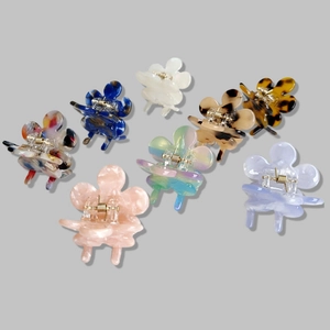 Set of eight colorful floral hair claw clips in acetate finish for elegant styling