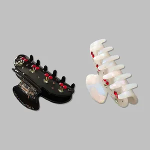 French style cherry hair claw clips in black and pearl white with rhinestone accents