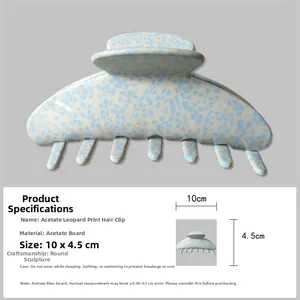 Detail view of acetate leopard claw clip in blue and white with 10x4.5cm dimensions