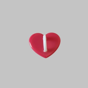 Detail of pink heart-shaped resin hook with 3M adhesive backing for phone cases