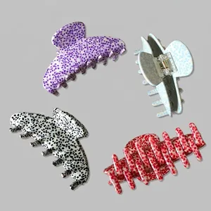 French retro oversized hair claws with spotted pattern in four assorted colors