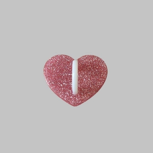 Detailed view of pink glitter heart phone hook with durable 3M adhesive backing