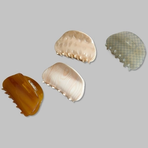 French retro acetate hair claws in amber, marble, and grey plaid patterns set