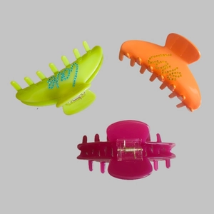 Neon large hair claw clips with Love rhinestone lettering for vintage back bun styles
