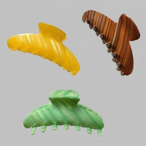 Lot de trois pinces à cheveux en acétate style français en jaune marron et vert