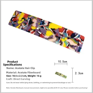 Detail view of large French acetate ponytail clip showing dimensions 10.5x2.3cm and abstract pattern