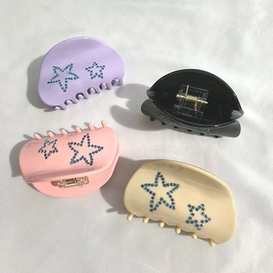 Pinces à cheveux en acétate avec étoiles en strass bleus en violet, rose, noir et beige