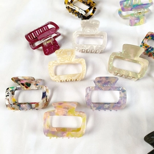 French minimalist square acetate hair claws in various marble and tortoiseshell patterns