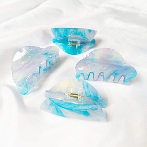 French style acrylic marble hair claws with blue glitter patterns and gold spring