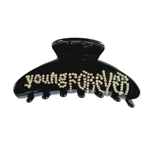 Molla per capelli nera lucida con scritte youngforever in strass su sfondo bianco