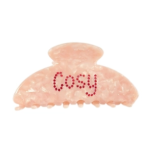 Pince à cheveux en acétate rose marbré avec lettrage Cosy en strass rouges brillant
