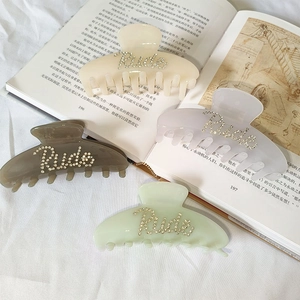 Large acetate shark hair clips with rhinestone Rude letters in four elegant colors