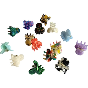 Mini acetate hair claws set in colorful patterns like marble and tortoiseshell for women