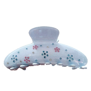 Pince à cheveux élégante en acétate bleu glacé avec strass brillants à motif floral