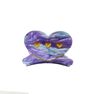 Elegant purple marble heart-shaped hair claw clip with golden accent and retro style