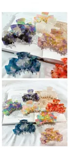 Macro detail of high-quality acetate hair claw clips with elegant marble patterns
