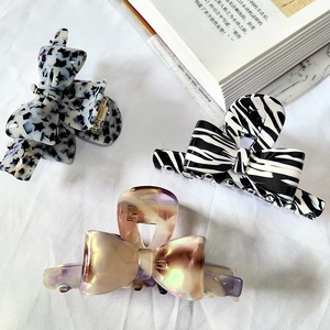 Pinze per capelli vintage in acetato a fiocco con motivi a stella, zebra e marrone