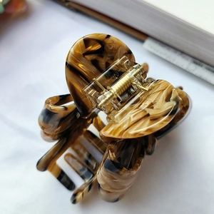 French vintage tortoiseshell pattern acetate hair claw clip with elegant floral texture
