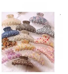 Collection de grandes pinces à cheveux en acétate avec motifs marbrés et léopard