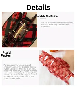 Detail view of the red plaid acetate hair claw clip showing the spring wrapped design