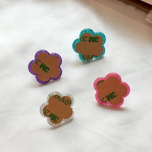Glittery plum blossom phone charms in four colors with strong 3M adhesive backing