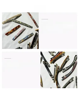 Detailed macro view of French style acetate hair clips with marble and tortoiseshell patterns