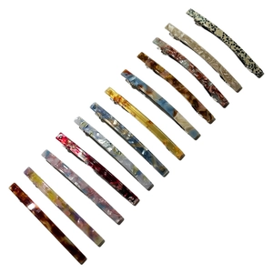 Set of 12 vintage acetate hair clips with tortoiseshell and marble patterns for women