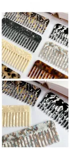 Flat lay of retro acetate wide-tooth hair combs in various marble and floral patterns