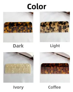 Detail view of acetate wide-tooth hair combs in four marble and tortoise patterns