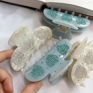 Pinces à cheveux élégantes en forme de cœur avec strass, bleu et crème marbré