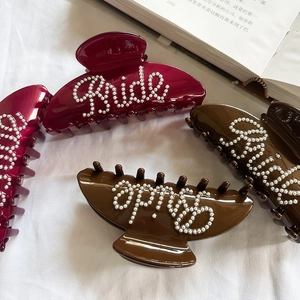 Elegant pearl Bride shark hair clips in burgundy and brown colors for weddings