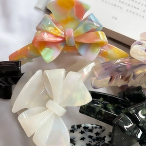 French acetate bow hair claw set with marbled, pearl white and black butterfly clips