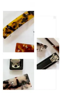 Detailed macro view of vintage acetate hair clips with sparkling rhinestones and metal spring