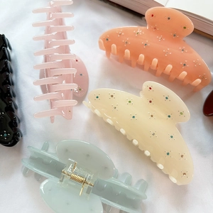 French star rhinestone acetate hair claw clips in assorted pastel colors for women