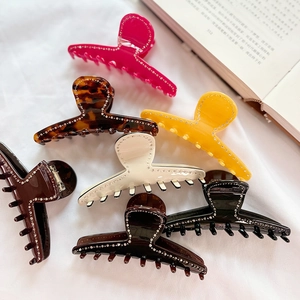 French vintage acetate hair claws with rhinestones in six colors on white background